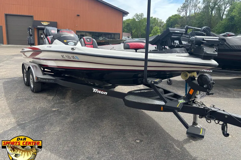 Slide: The Image of 2018 Triton 20 TrX boat on trailer at D&R Sports Center parking lot. - 4