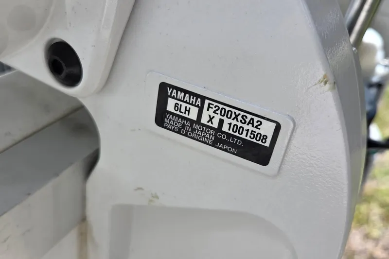Slide: The Image of Yamaha F200XSA2 engine label on 2025 Sea Hunt Ultra 265 SE boat. - 17