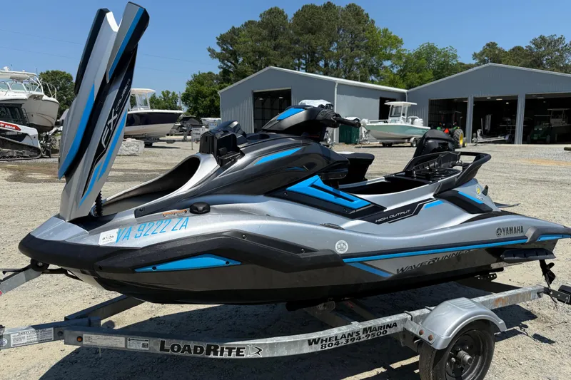 Slide: The Image of 2020 Yamaha WaveRunner FX Cruiser HO on trailer at marina. - 1