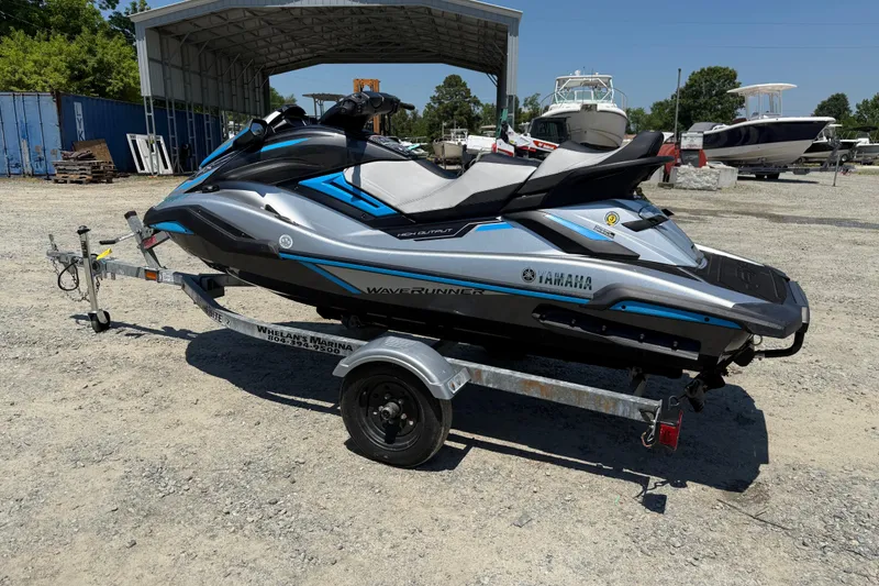 Slide: The Image of 2020 Yamaha WaveRunner FX Cruiser HO on trailer in marina setting. - 10