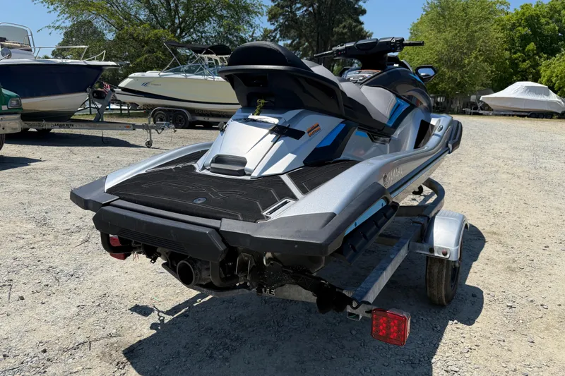 Slide: The Image of 2020 Yamaha WaveRunner FX Cruiser HO on trailer in sunny outdoor setting. - 13