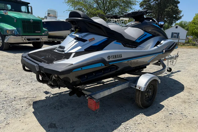 Slide: The Image of 2020 Yamaha WaveRunner FX Cruiser HO on trailer, parked outdoors. - 14