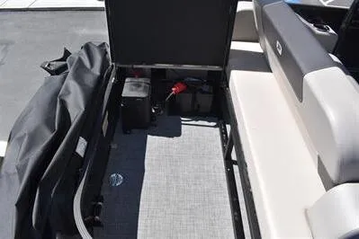 Slide: The Image of 2026 Princecraft Quorum 25 RL boat storage compartment with seating and equipment. - 15