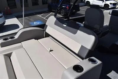 Slide: The Image of 2026 Princecraft Quorum 25 RL boat interior with comfortable seating and cup holders. - 16