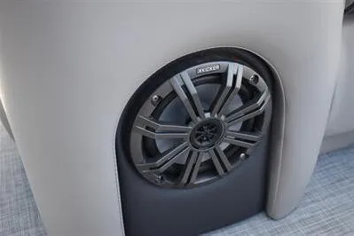 Slide: The Image of 2026 Princecraft Quorum 25 RL boat speaker detail, featuring a sleek Kicker audio system. - 19