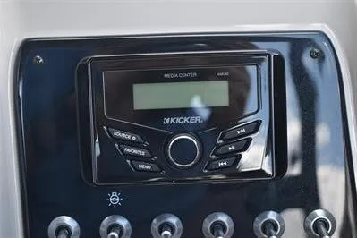 Slide: The Image of 2026 Princecraft Quorum 25 RL boat dashboard with Kicker media center. - 25