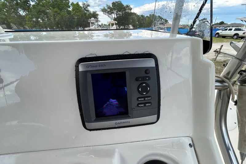 Slide: The Image of Garmin GPSmap 440s on 2014 Key West 176 Sportsman CC boat dashboard. - 12