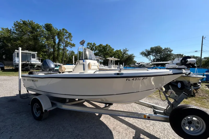 Slide: The Image of 2014 Key West 176 Sportsman CC boat on trailer, parked outdoors. - 5