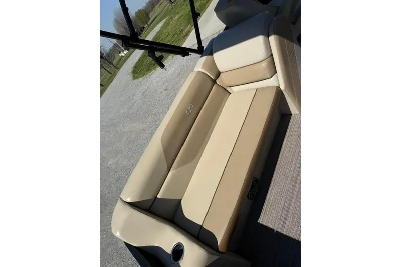 Slide: The Image of 2022 Veranda Vista View22RC TT boat seat, beige upholstery, outdoor setting. - 12