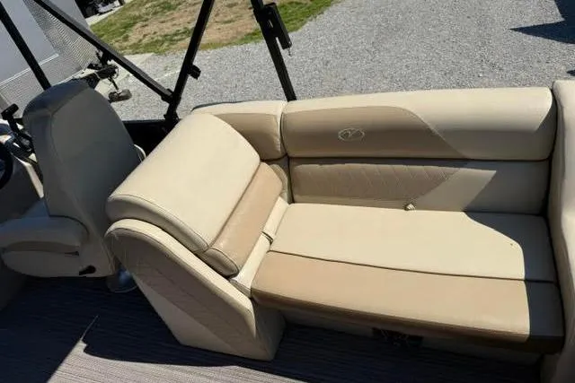 Slide: The Image of Luxurious seating on 2022 Veranda Vista View22RC TT pontoon boat, featuring beige upholstery. - 13