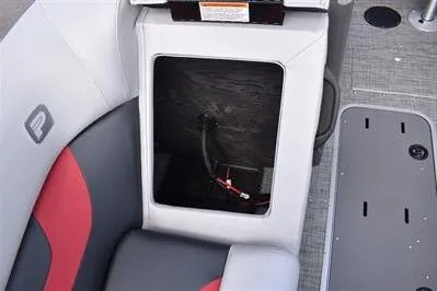 Slide: The Image of 2026 Princecraft Ventura 194 boat interior storage compartment with seating and wiring visible. - 14