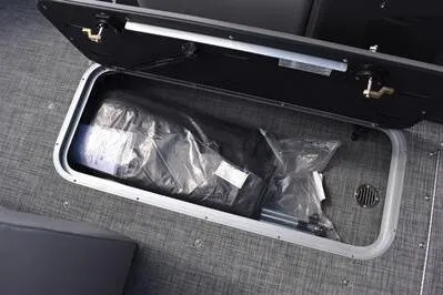 Slide: The Image of Storage compartment in 2026 Princecraft Ventura 194 boat, featuring organized interior space. - 16