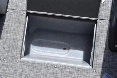 Slide: The Image of Storage compartment on 2026 Princecraft Ventura 194 boat, featuring durable interior design. - 17