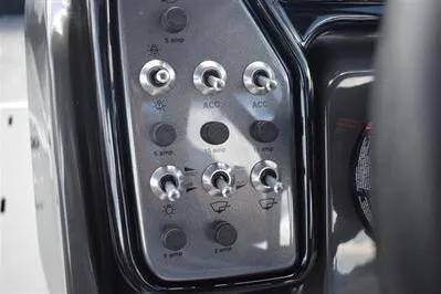 Slide: The Image of Control panel of 2026 Princecraft Ventura 194 boat with switches and buttons. - 24