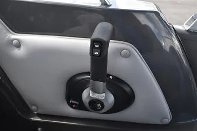 Slide: The Image of 2026 Princecraft Ventura 194 boat throttle control with up and down buttons. - 27