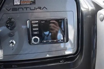 Slide: The Image of 2026 Princecraft Ventura 194 dashboard with Kicker audio system. - 28