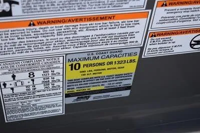 Slide: The Image of 2026 Princecraft Ventura 194 capacity label: 10 persons or 1323 lbs maximum. - 29