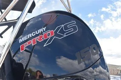 Slide: The Image of Mercury Pro XS 150 engine on 2026 Princecraft Ventura 194 boat under blue sky. - 6
