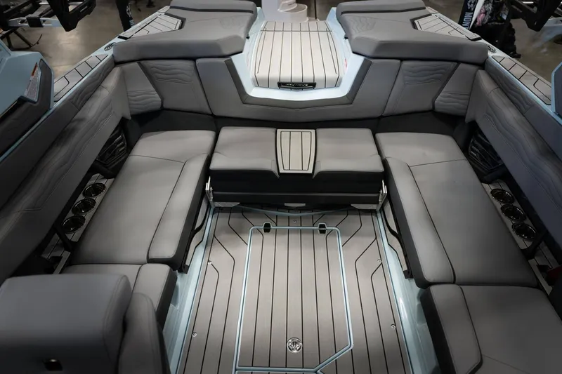 Slide: The Image of Interior of 2026 Nautique G23 with luxurious gray seating. - 10