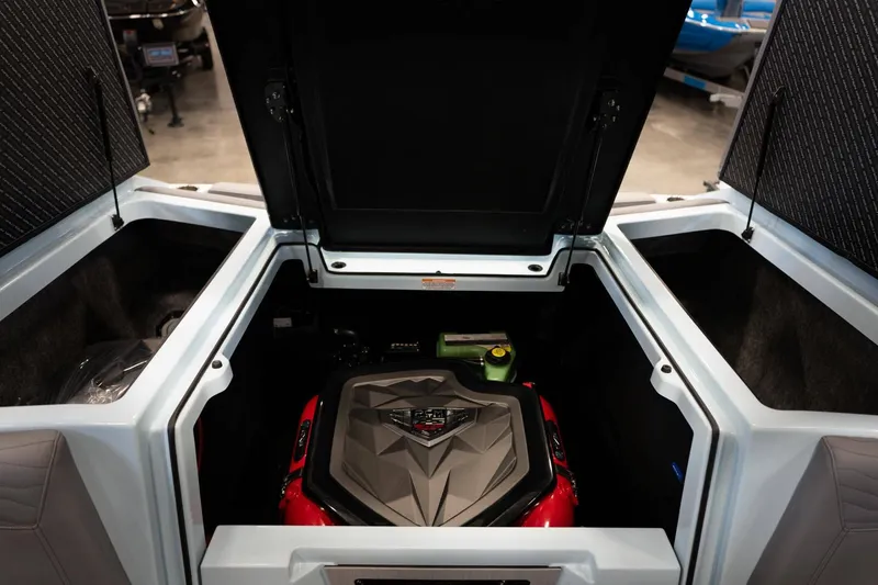 Slide: The Image of 2026 Nautique G23 engine compartment with open hatch. - 15