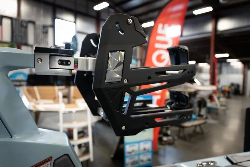 Slide: The Image of Nautique G23 2026 boat accessory in a workshop. - 22