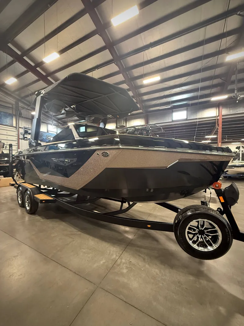 The Image of 2026 Nautique Super Air Nautique S23 in a warehouse setting. - 1