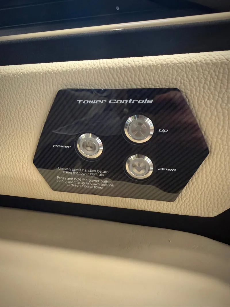 Slide: The Image of 2026 Nautique Super Air S23 tower control panel close-up. - 13