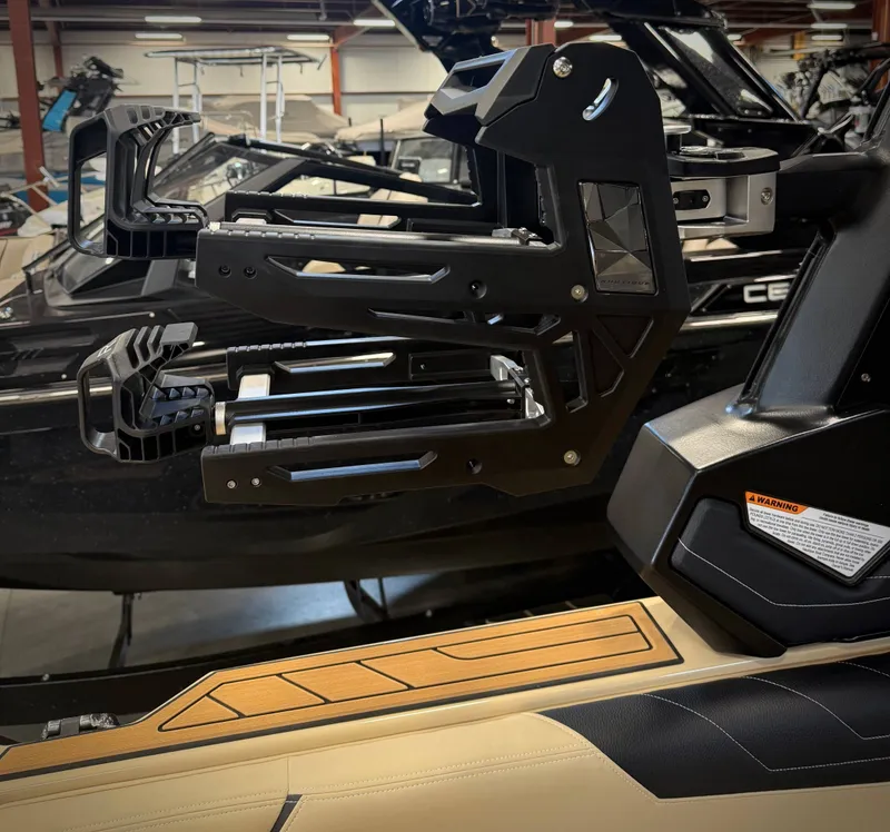 Slide: The Image of 2026 Nautique Super Air Nautique S23 with advanced board rack. - 21