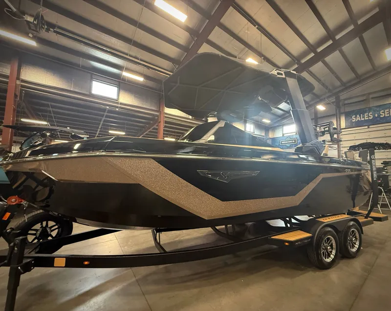 Slide: The Image of 2026 Nautique Super Air Nautique S23 in a warehouse setting. - 5