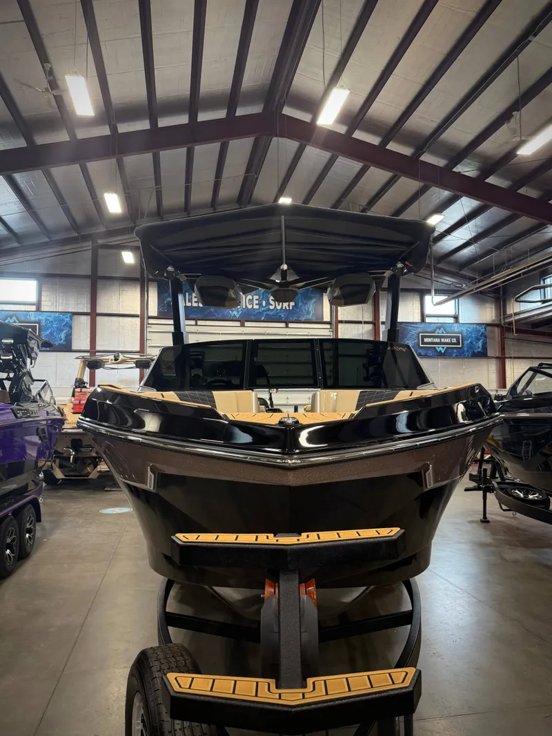 Slide: The Image of 2026 Nautique Super Air Nautique S23 in a showroom. - 7