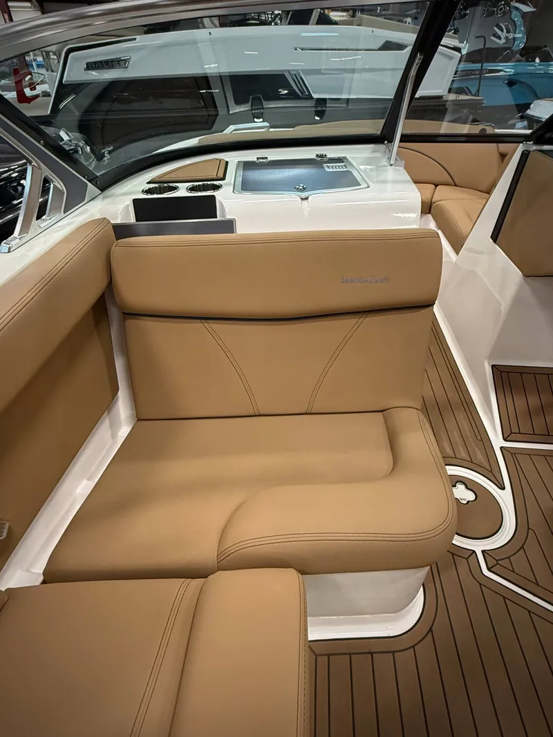 Slide: The Image of Interior of 2021 MasterCraft XT22 with beige leather seating. - 14