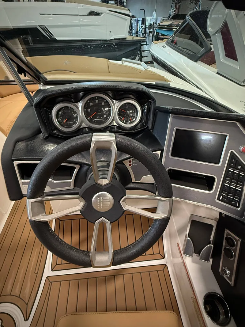 Slide: The Image of Interior view of 2021 MasterCraft XT22 boat cockpit. - 9