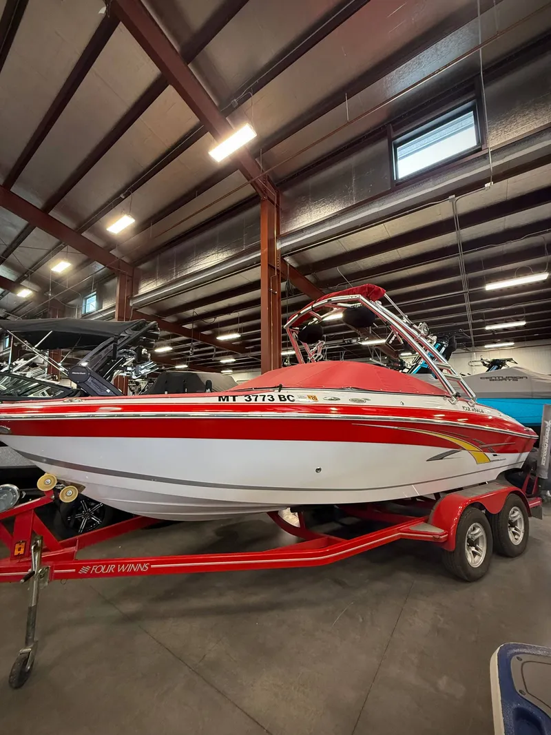 The Image of 2007 Four Winns 210 Horizon boat in warehouse. - 1