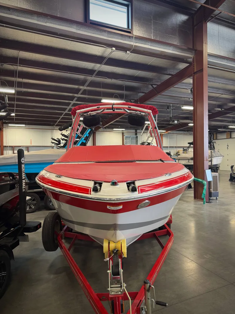 Slide: The Image of 2007 Four Winns 210 Horizon boat in warehouse. - 2