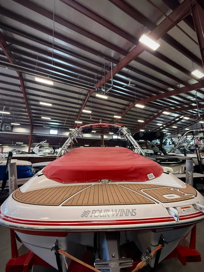 Slide: The Image of 2007 Four Winns 210 Horizon boat in warehouse. - 3
