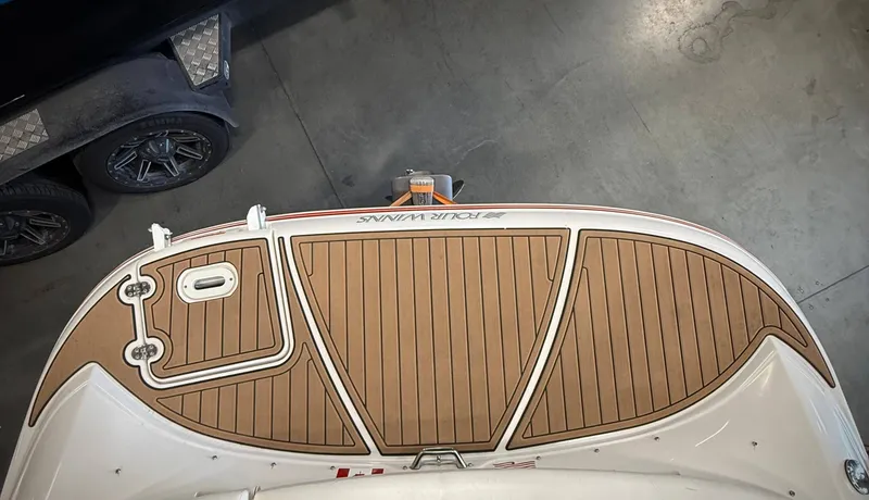 Slide: The Image of Rear view of a 2007 Four Winns 210 Horizon boat. - 5