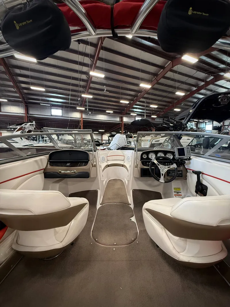 Slide: The Image of Interior of a 2007 Four Winns 210 Horizon boat in a warehouse. - 8