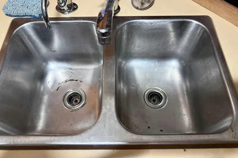 Slide: The Image of Stainless steel double kitchen sink with faucet, CAL 33 model, 1986. - 23