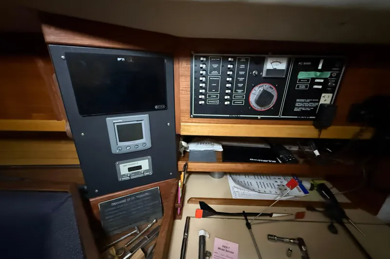 Slide: The Image of Electrical control panel inside a 1986 CAL 33 sailboat cabin. - 25