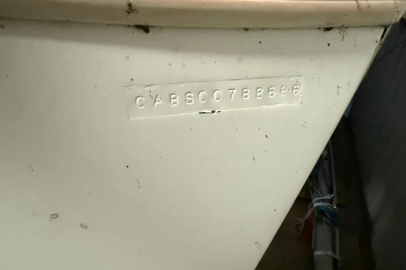 Slide: The Image of Hull identification number on a 1986 CAL 33 sailboat. - 41