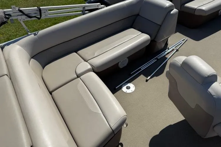 Slide: The Image of 2016 Princecraft Vectra 21 boat interior with beige seating and accessories. - 7