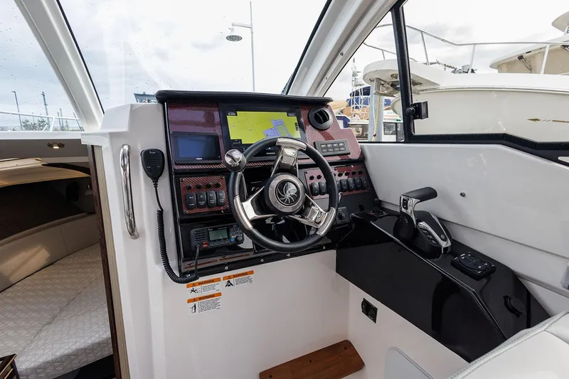 Slide: The Image of Manufacturer Provided Image: 2025 Solara S-250 Coupe cockpit with modern navigation and control systems. - 11