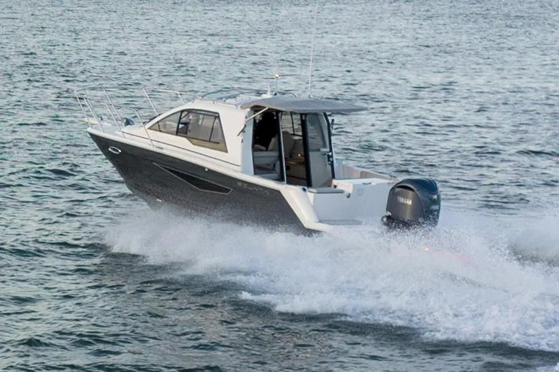 Slide: The Image of Manufacturer Provided Image: 2025 Solara S-250 Coupe cruising on open water. - 4
