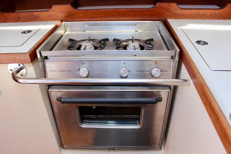 Slide: The Image of Stainless steel stove and oven in 1989 Catalina 36 yacht kitchen. - 34