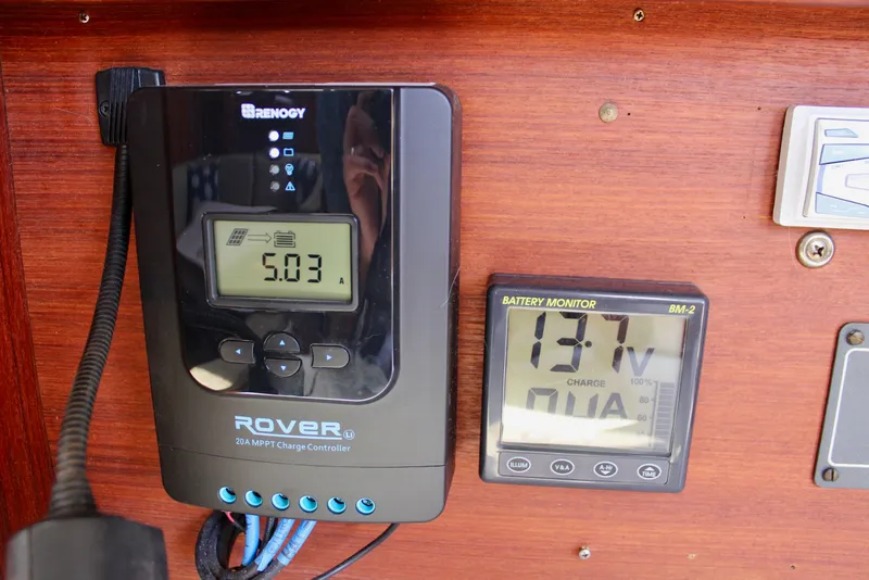 Slide: The Image of Renogy Rover charge controller and battery monitor on 1989 Catalina 36 yacht. - 39