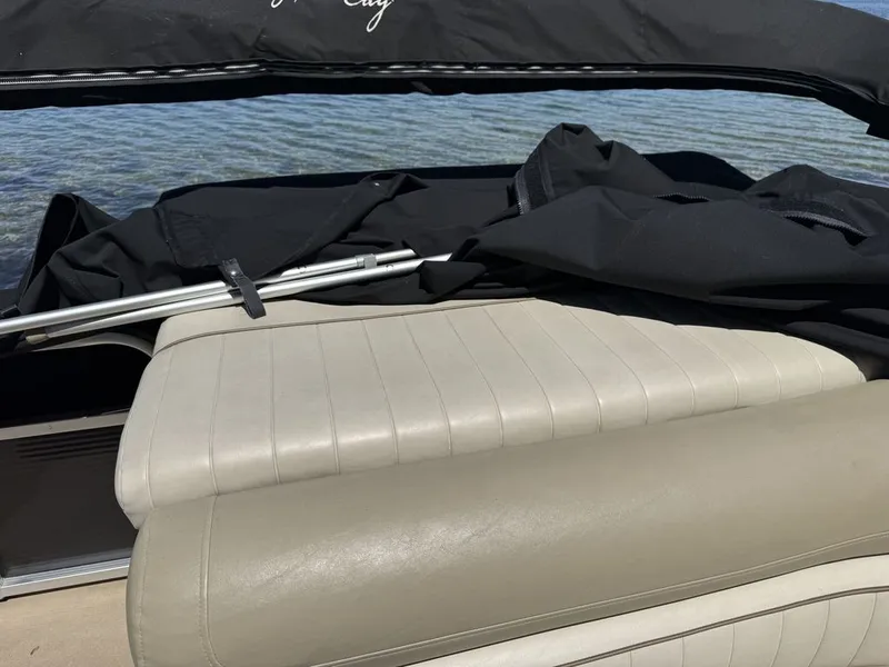 Slide: The Image of Cypress Cay 220 Cabana 2011 with beige seat and black cover. - 11