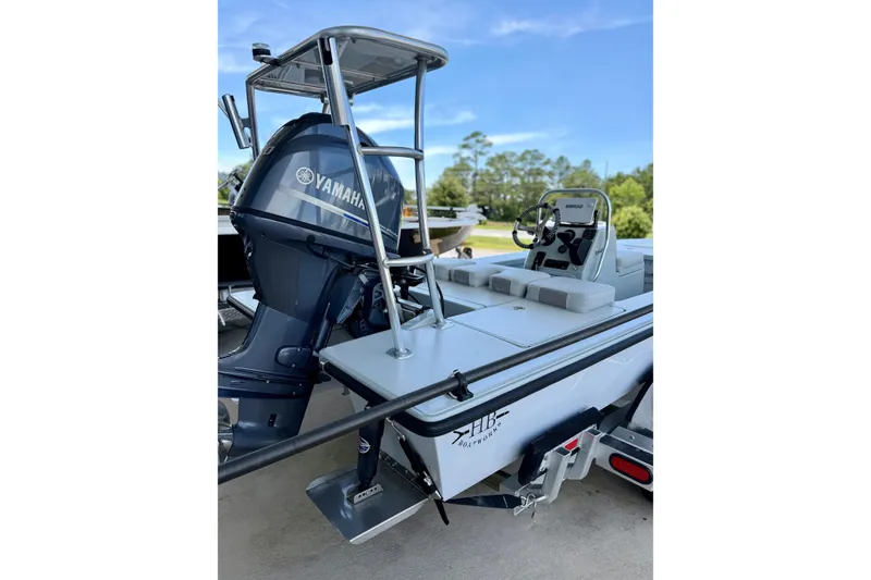 Slide: The Image of 2020 Hells Bay Professional boat with Yamaha engine, parked on a trailer. - 8