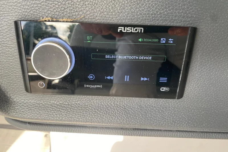 Slide: The Image of Fusion audio system on 2021 Regal 3300 Bowrider, displaying Bluetooth device selection. - 24