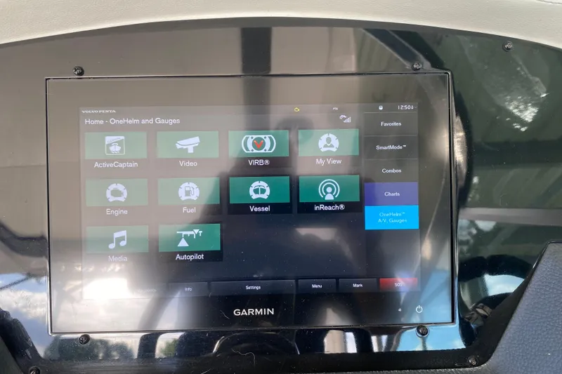Slide: The Image of Garmin touchscreen display on 2021 Regal 3300 Bowrider, showing navigation and control options. - 27