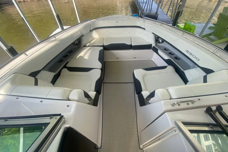 Slide: The Image of 2021 Regal 3300 Bowrider interior with spacious seating and modern design. - 28